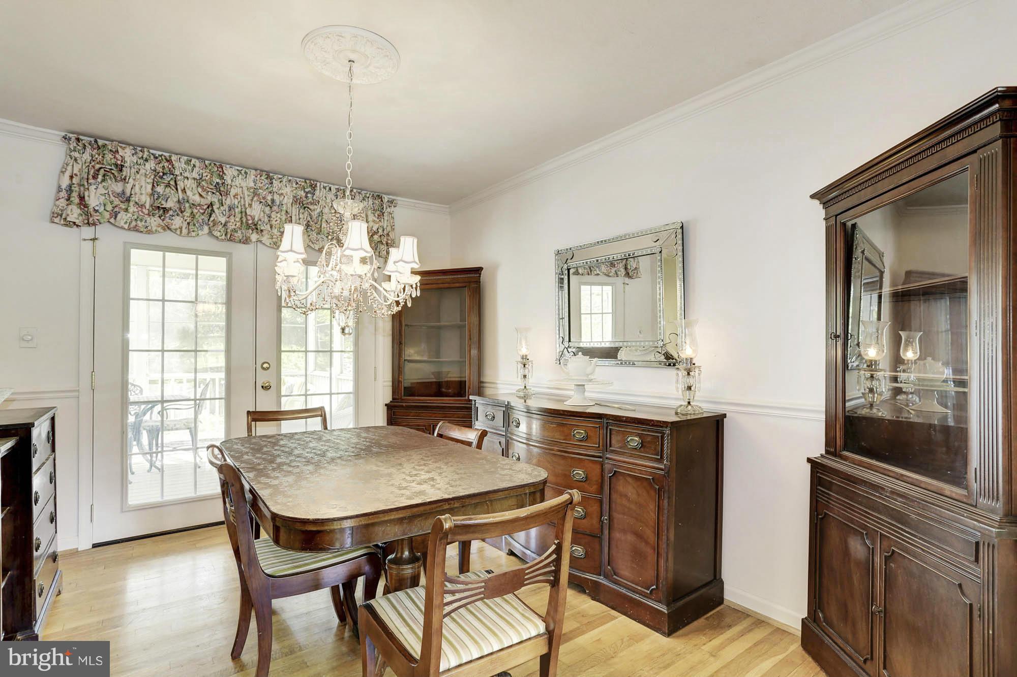 6501 Darwin Road Laurel, MD 20707 - Photo 6 of 30 a view of a dining room with furniture and window