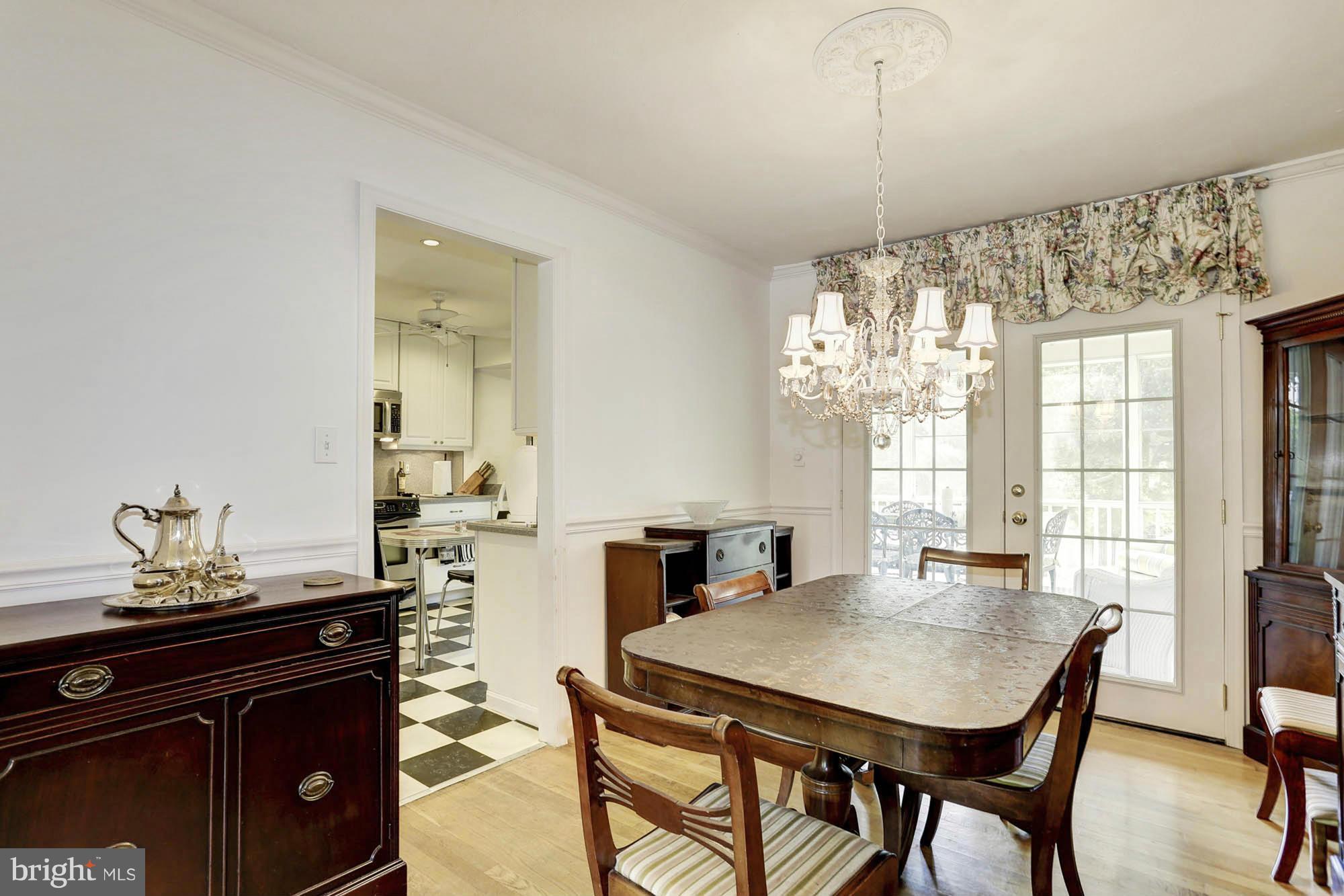 6501 Darwin Road Laurel, MD 20707 - Photo 7 of 30 a view of a dining room with furniture and window