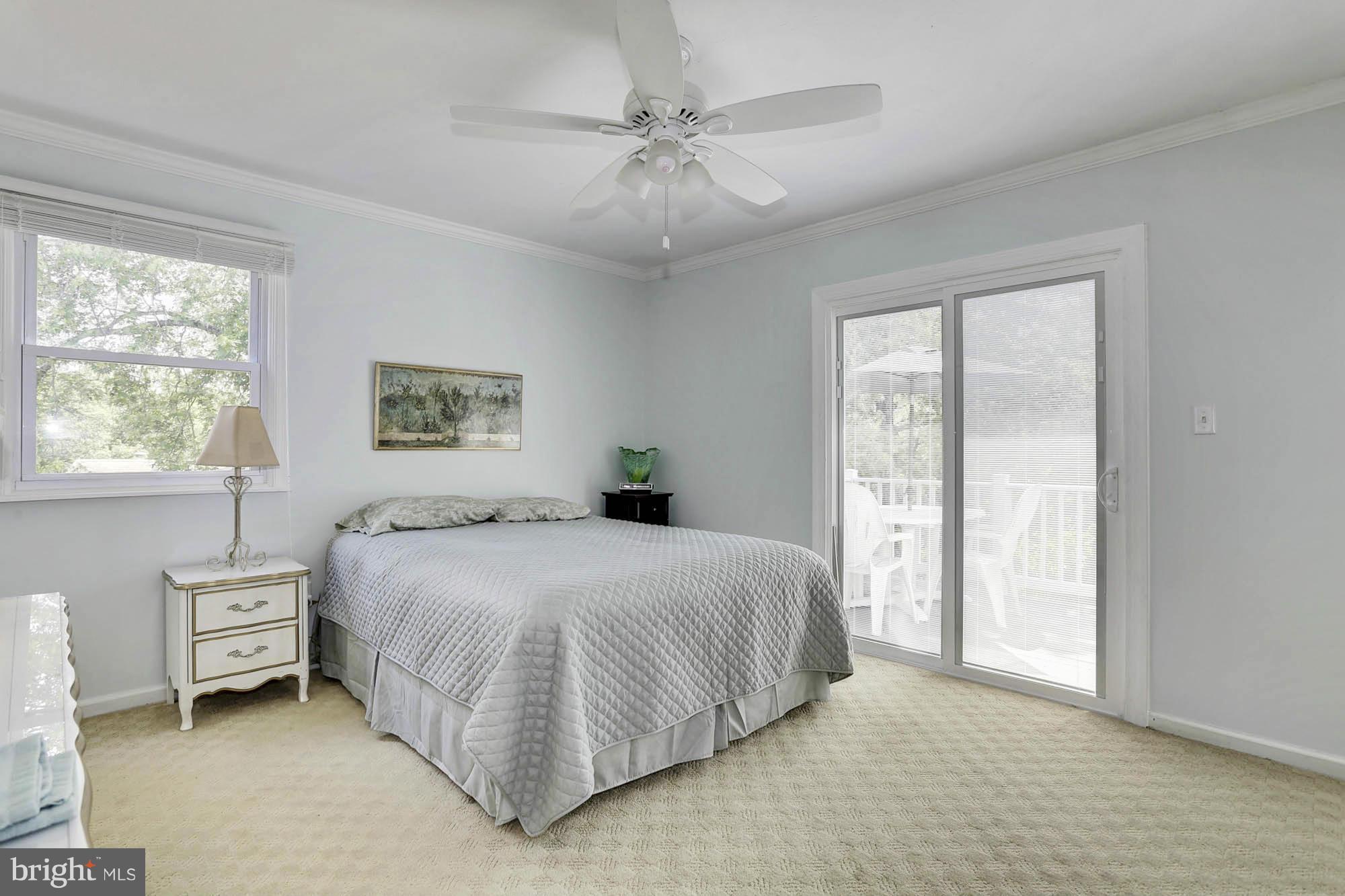 6501 Darwin Road Laurel, MD 20707 - Photo 10 of 30 a bedroom with a large bed and a window