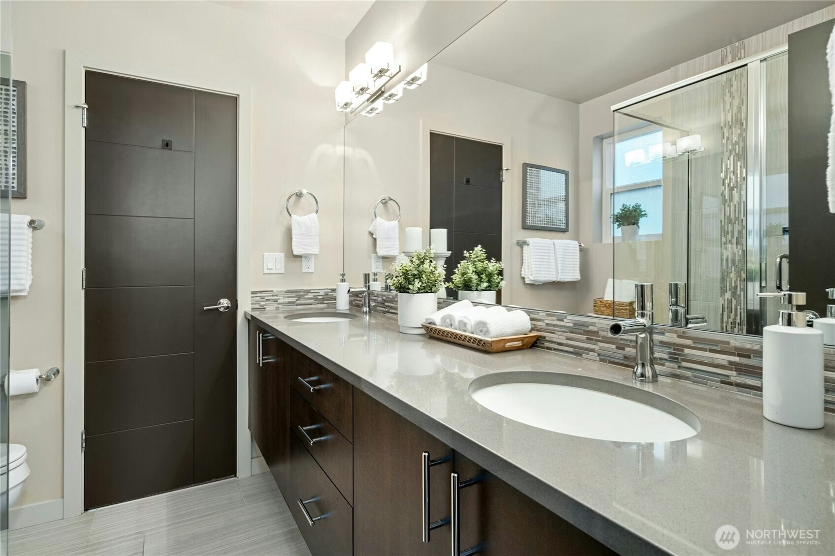 1743 Northwest 60th Street, Unit A Seattle, WA 98107 - Photo 16 of 33 a bathroom with a granite countertop sink and a mirror