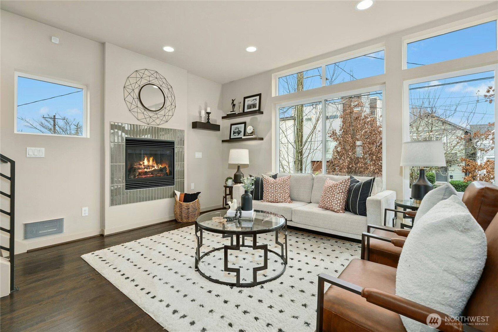 1743 Northwest 60th Street, Unit A Seattle, WA 98107 - Photo 3 of 33 a living room with furniture and a fireplace