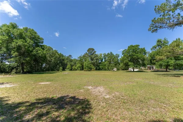 a view of outdoor space and yard