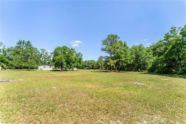 a view of outdoor space and yard