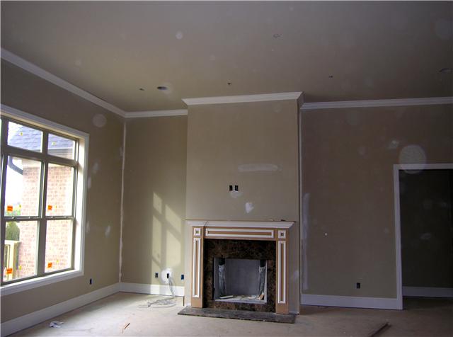 3206 Appian Way, Unit 72 Spring Hill, TN 37174 - Photo 7 of 12 Left of fireplace, is a transom-topped window wall, on rear of family room. Impressive, 12' tall Family room ceiling.