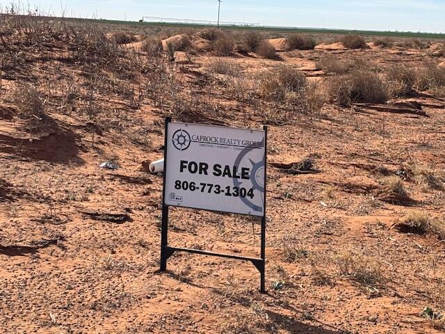 225 County Rd Plains Plains, TX 79355 - Photo 2 of 8 a view of a sign board