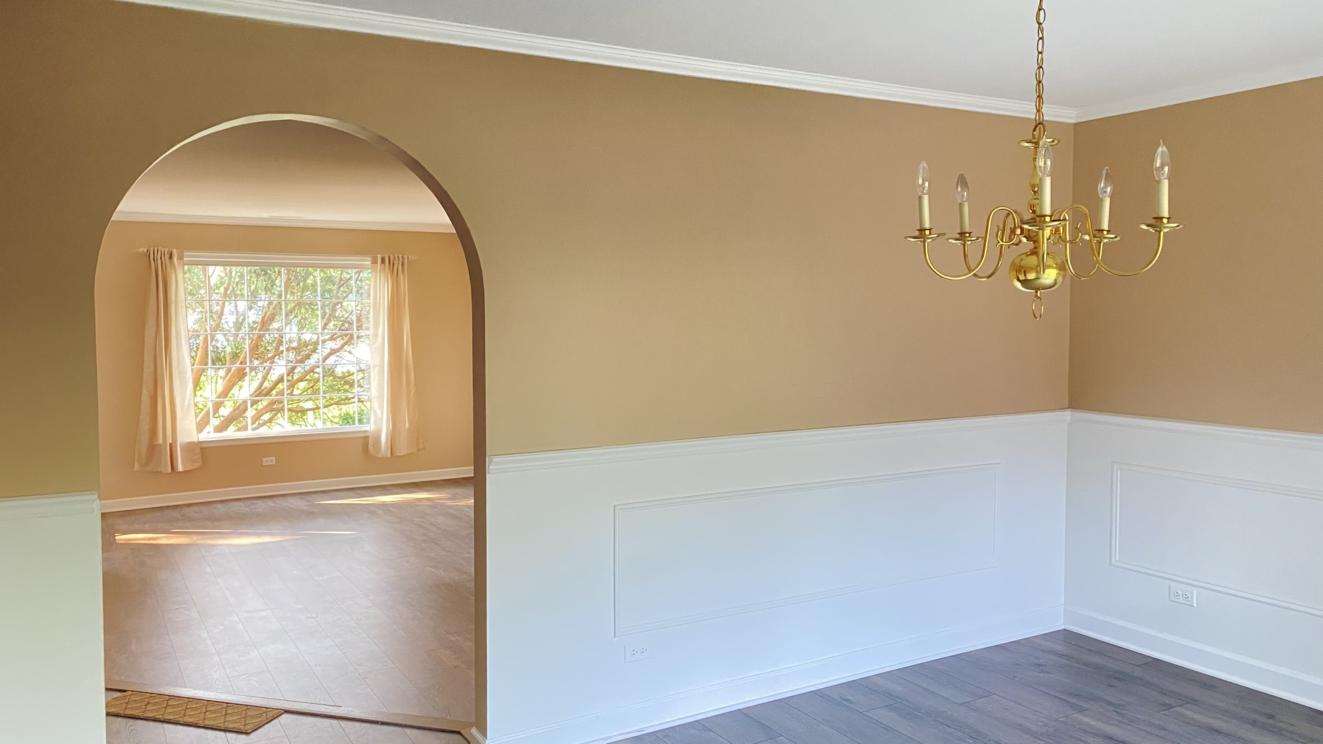 23 North Tower Road Oak Brook, IL 60523 - Photo 12 of 22 a view of empty room with wooden floor and fan