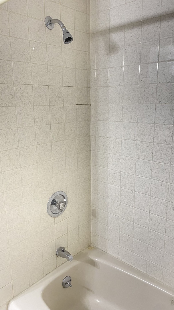 23 North Tower Road Oak Brook, IL 60523 - Photo 19 of 22 a bathroom with a sink and a shower