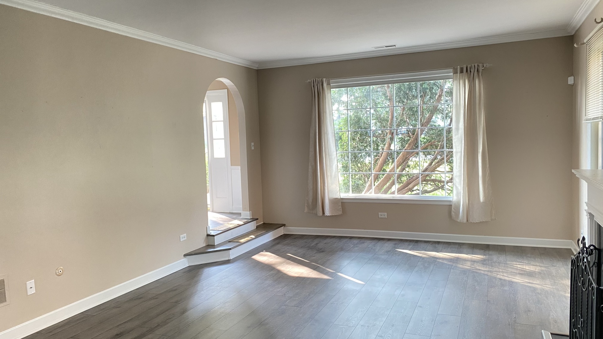 23 North Tower Road Oak Brook, IL 60523 - Photo 8 of 22 an empty room with wooden floor and windows