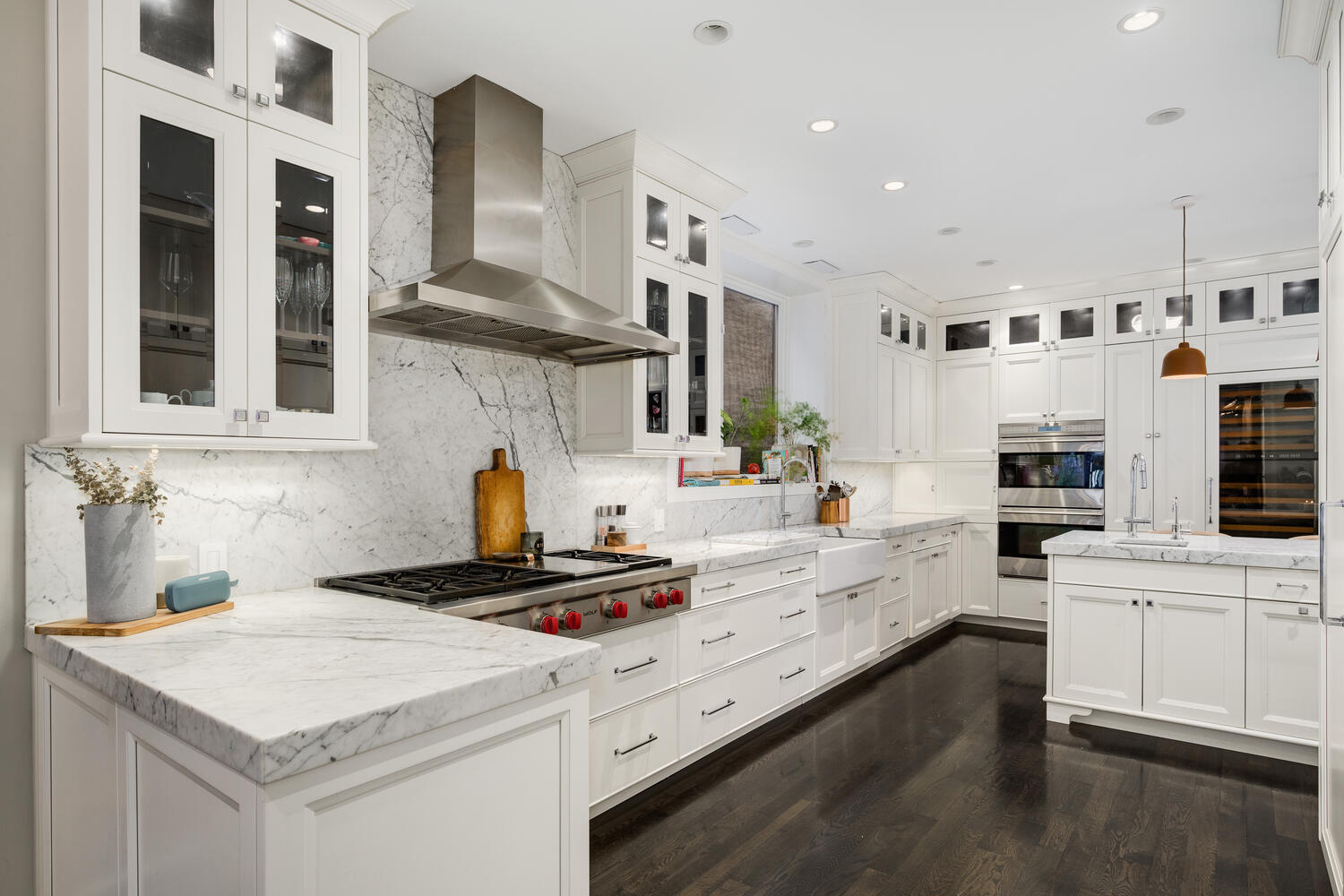 64 East Elm Street, Unit 3 Chicago, IL 60611 - Photo 16 of 30 a kitchen with stainless steel appliances a stove a sink and a refrigerator