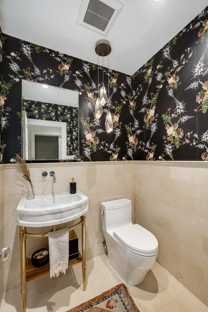 64 East Elm Street, Unit 3 Chicago, IL 60611 - Photo 17 of 30 a bathroom with a toilet sink and mirror