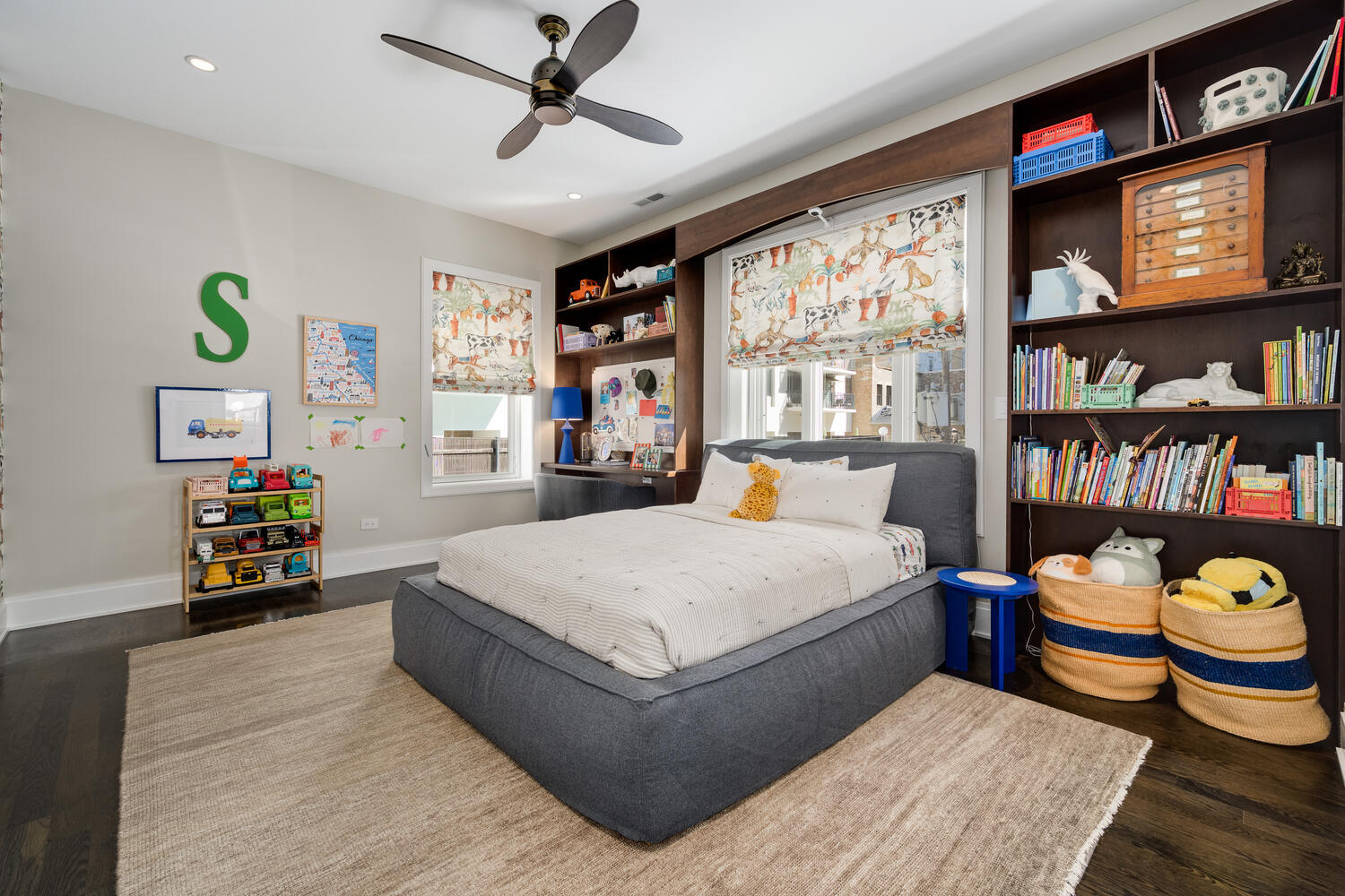 64 East Elm Street, Unit 3 Chicago, IL 60611 - Photo 22 of 30 a bed room with a bed and a book shelf