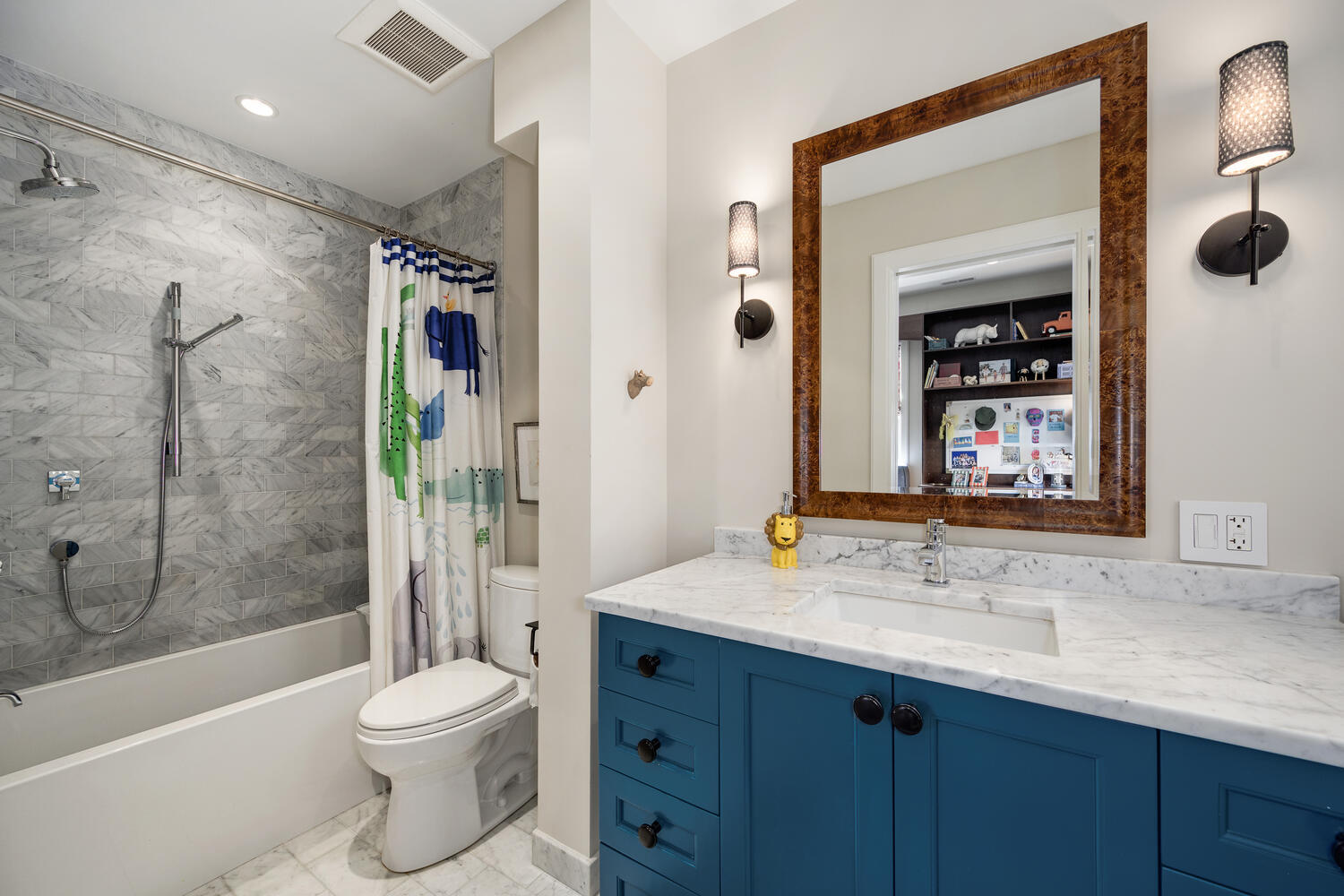 64 East Elm Street, Unit 3 Chicago, IL 60611 - Photo 23 of 30 a bathroom with a sink a toilet and shower