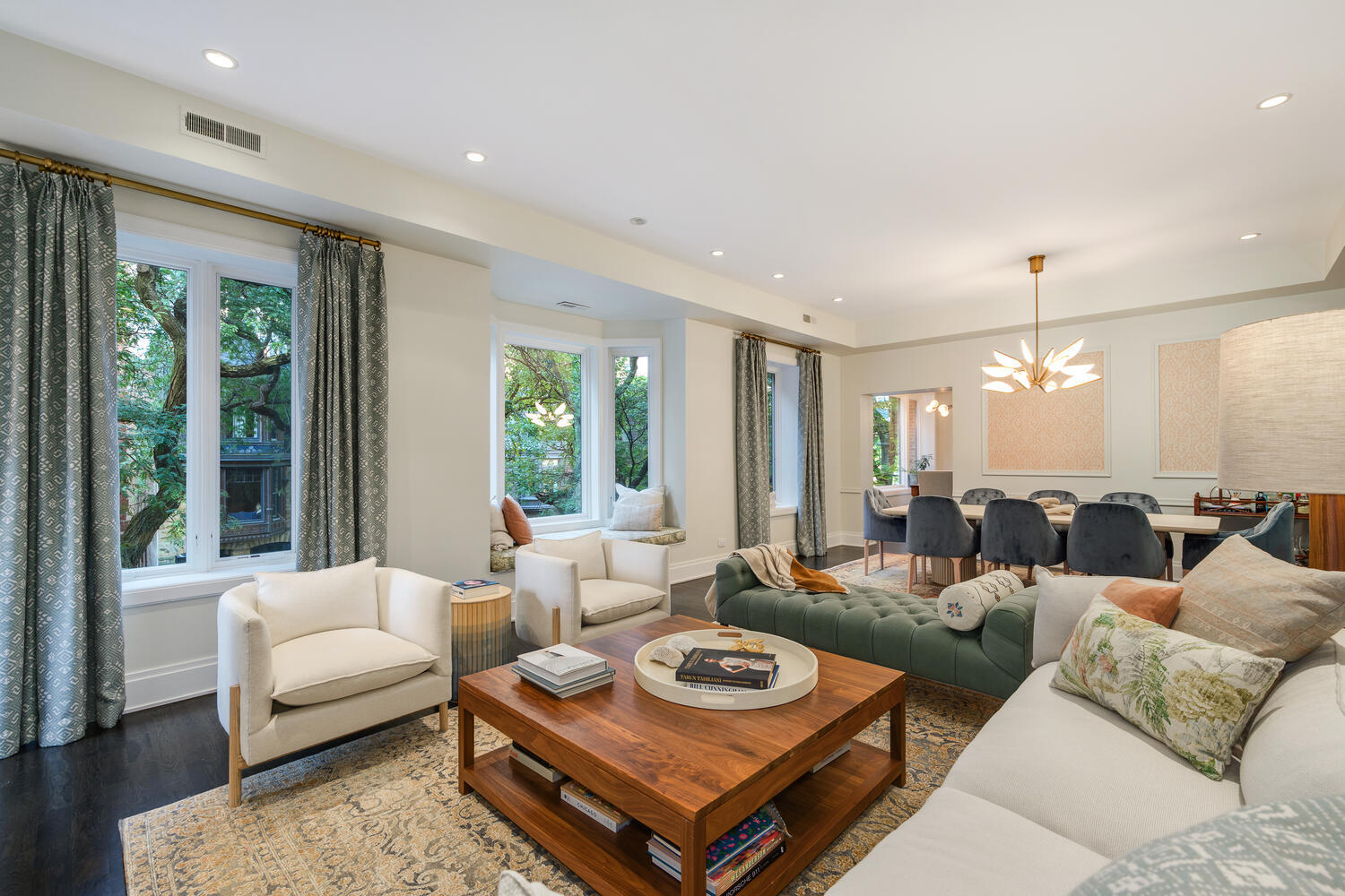 64 East Elm Street, Unit 3 Chicago, IL 60611 - Photo 3 of 30 a living room with furniture and a large window