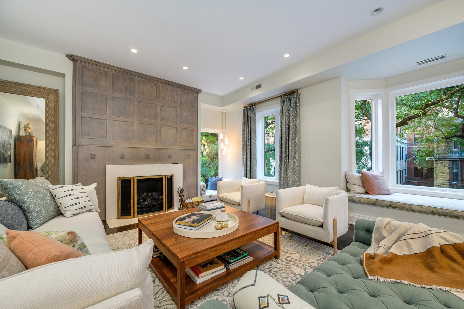 64 East Elm Street, Unit 3 Chicago, IL 60611 - Photo 4 of 30 a living room with furniture and a fireplace