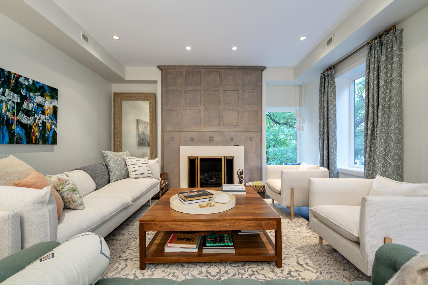 64 East Elm Street, Unit 3 Chicago, IL 60611 - Photo 5 of 30 a living room with furniture a large window and a fireplace