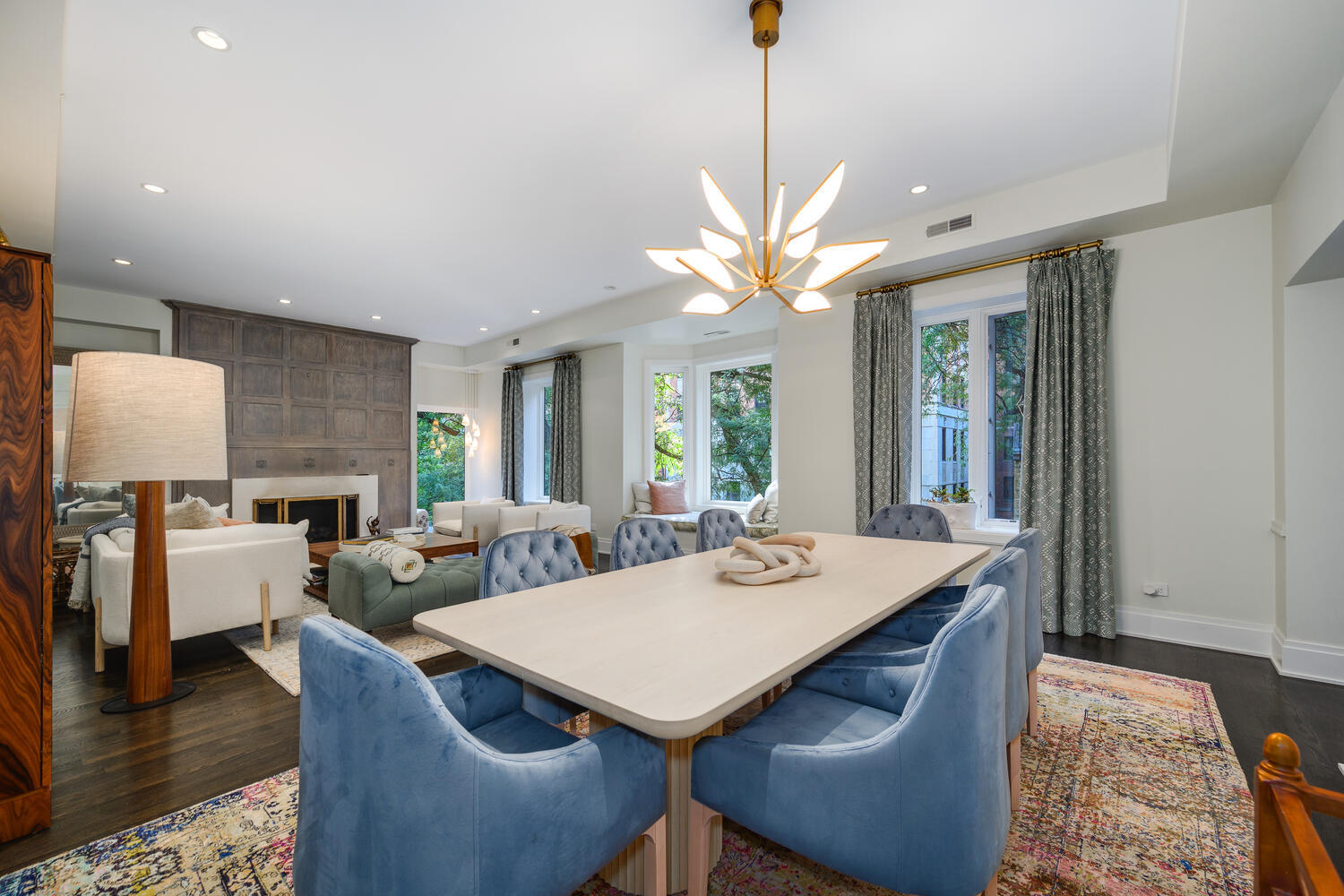 64 East Elm Street, Unit 3 Chicago, IL 60611 - Photo 6 of 30 a view of a dining room with furniture window and wooden floor