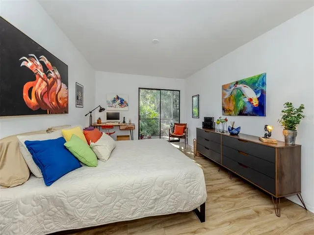 swimming pool view with a seating space