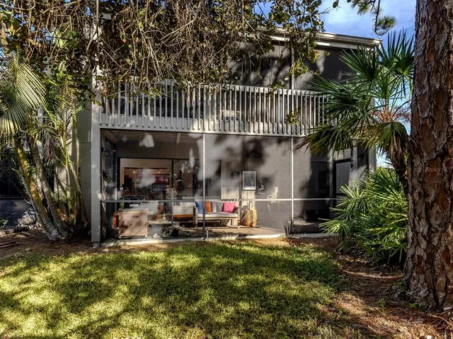 a view of a park with a tree