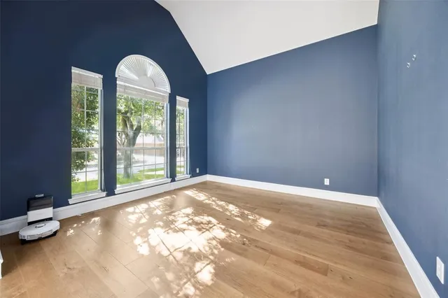a bathroom with a bathtub sink and a window