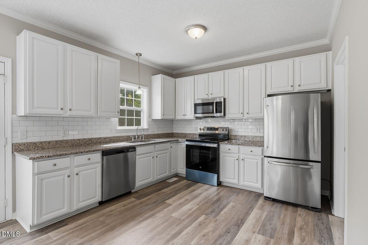 1036 Blue River Farm Drive Raleigh, NC 27603 - Photo 20 of 47 I_K 3