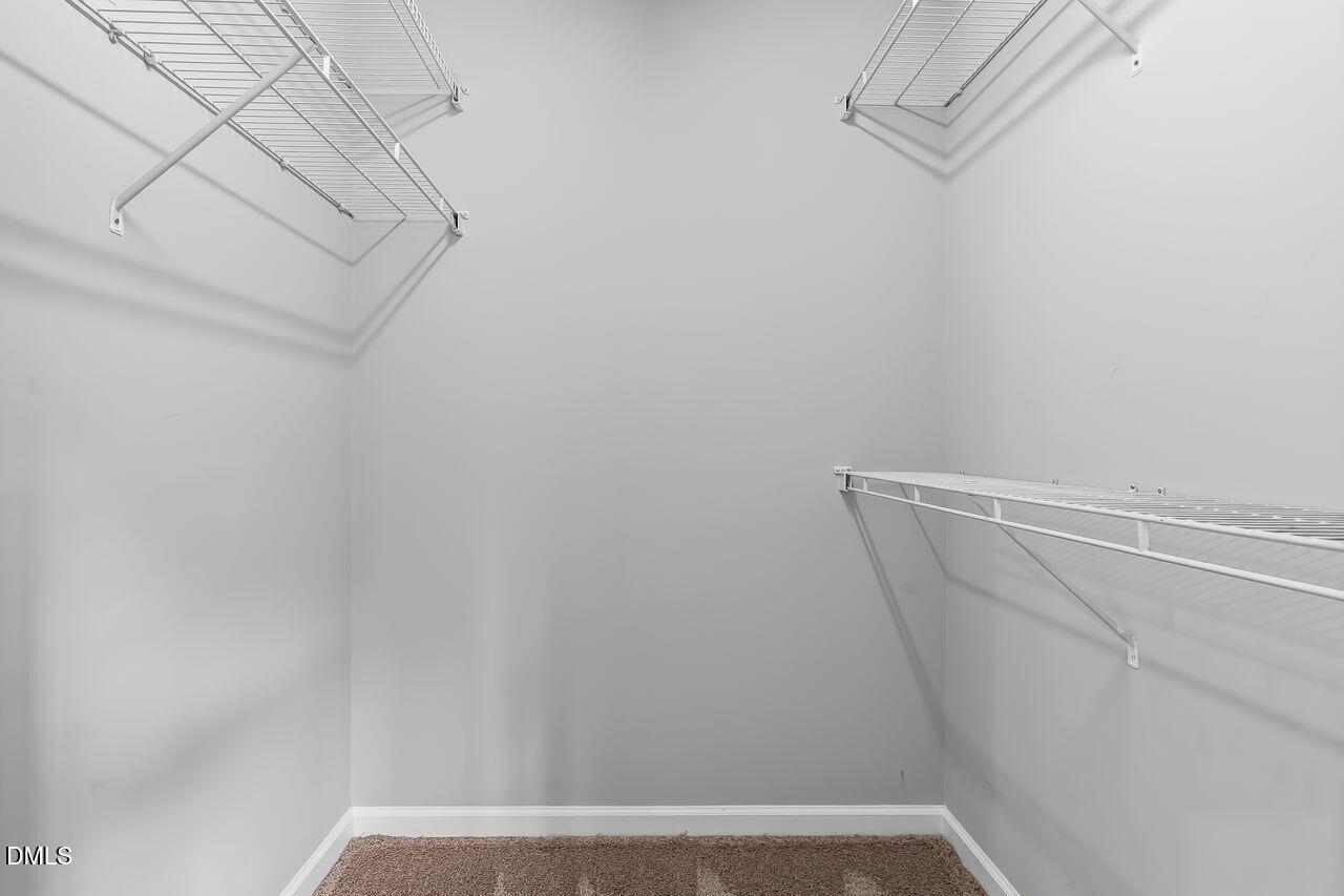 1036 Blue River Farm Drive Raleigh, NC 27603 - Photo 28 of 47 I_Bed Primary Closet