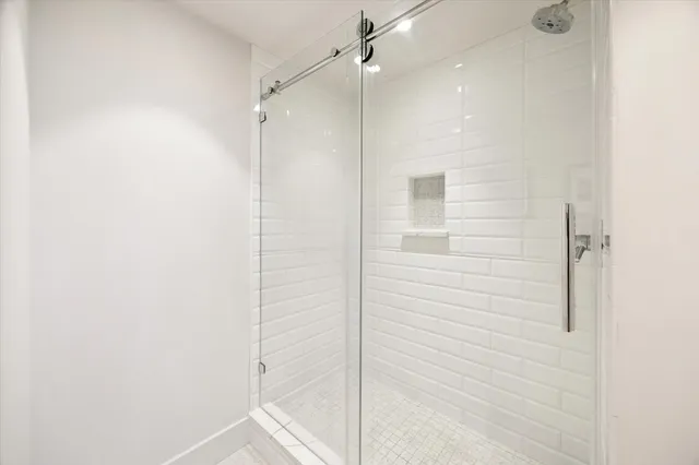 a living room with furniture a window and a table