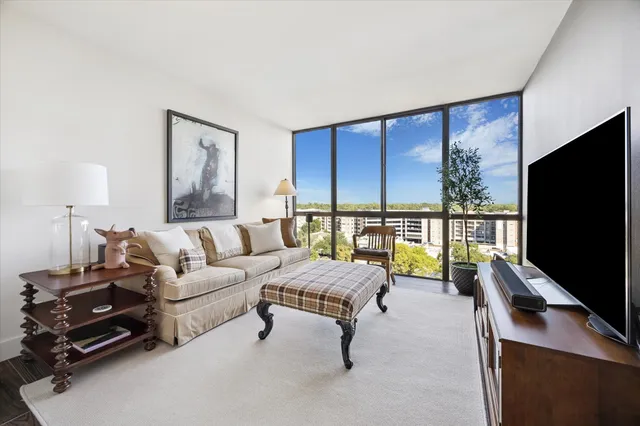 a bathroom with a shower and a glass door