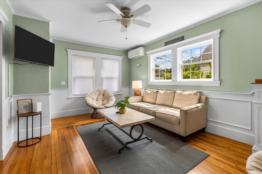 321 Winter Street Barnstable, MA 02601 - Photo 11 of 35 a living room with furniture and a flat screen tv