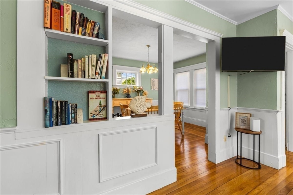 321 Winter Street Barnstable, MA 02601 - Photo 13 of 35 a view of living room kitchen with furniture and flat screen tv