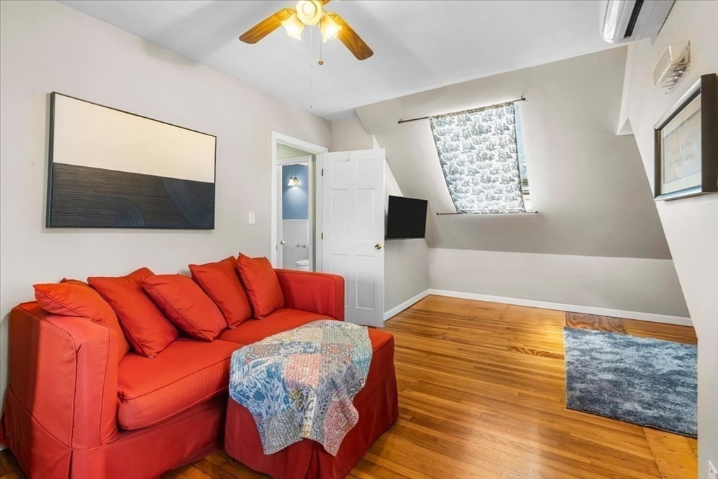321 Winter Street Barnstable, MA 02601 - Photo 18 of 35 a living room with furniture and a flat screen tv
