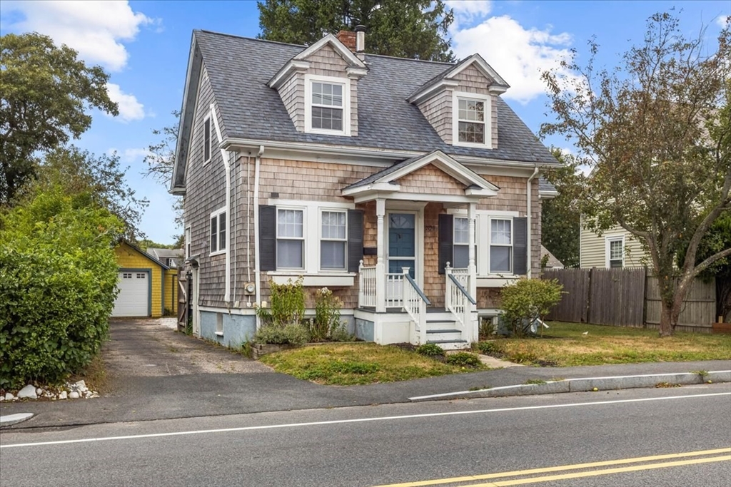 321 Winter Street Barnstable, MA 02601 - Photo 2 of 35 a front view of a house with a yard