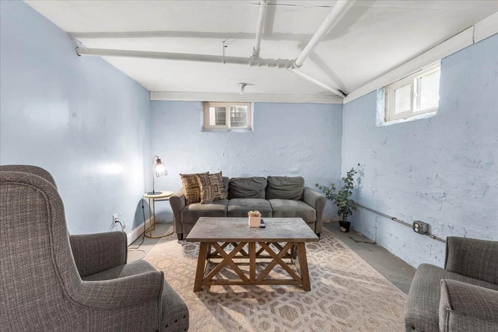 321 Winter Street Barnstable, MA 02601 - Photo 24 of 35 a living room with furniture and a couch