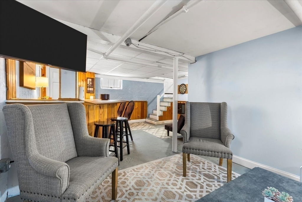 321 Winter Street Barnstable, MA 02601 - Photo 26 of 35 a living room with furniture and a couch