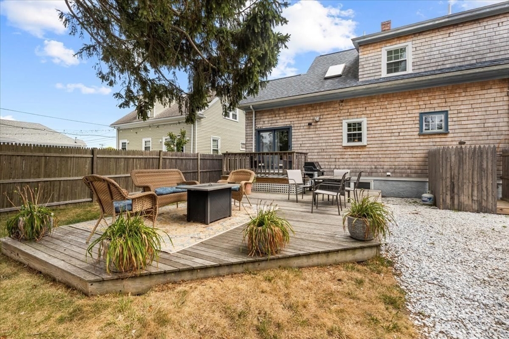 321 Winter Street Barnstable, MA 02601 - Photo 4 of 35 a view of a backyard with a patio
