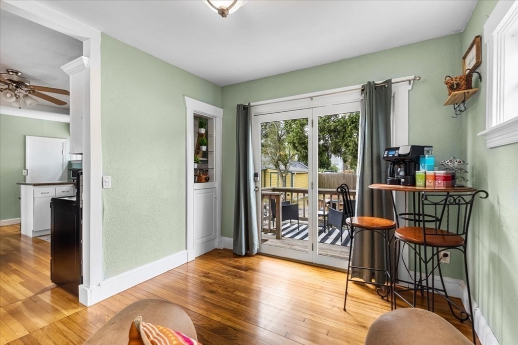 321 Winter Street Barnstable, MA 02601 - Photo 5 of 35 a workspace with furniture large windows and wooden floor