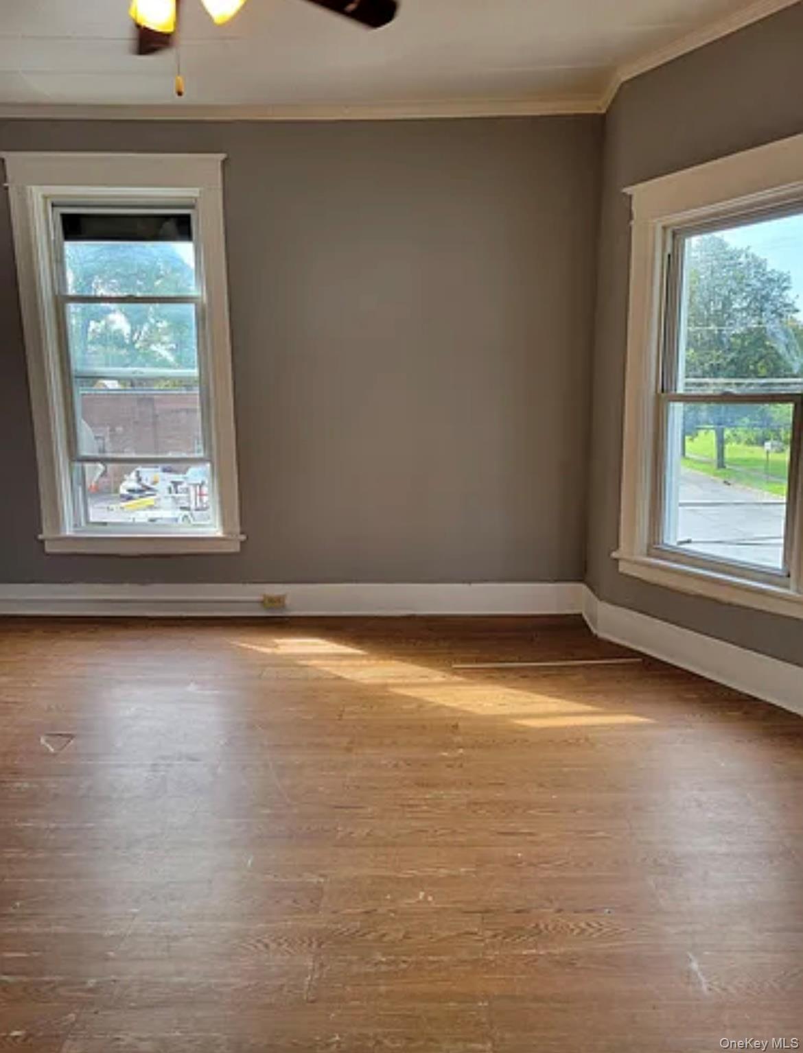 91 Pershing Avenue Poughkeepsie, NY 12601 - Photo 3 of 13 an empty room with a window