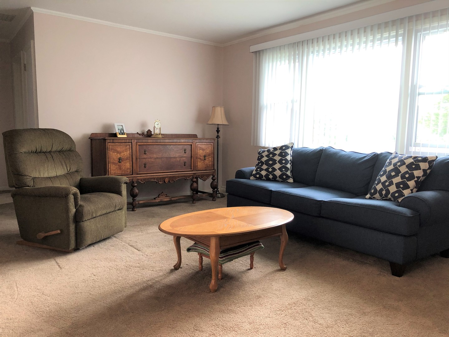 2004 Old Elm Road Lindenhurst, IL 60046 - Photo 2 of 19 a living room with furniture and a window
