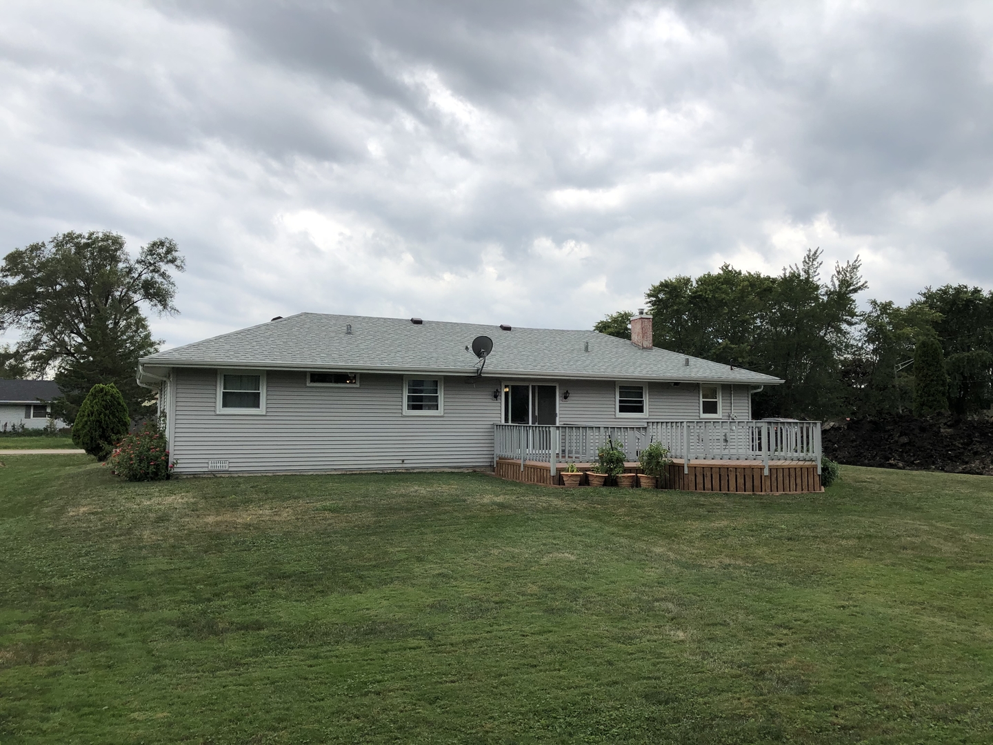 2004 Old Elm Road Lindenhurst, IL 60046 - Photo 17 of 19 a view of a house with a yard