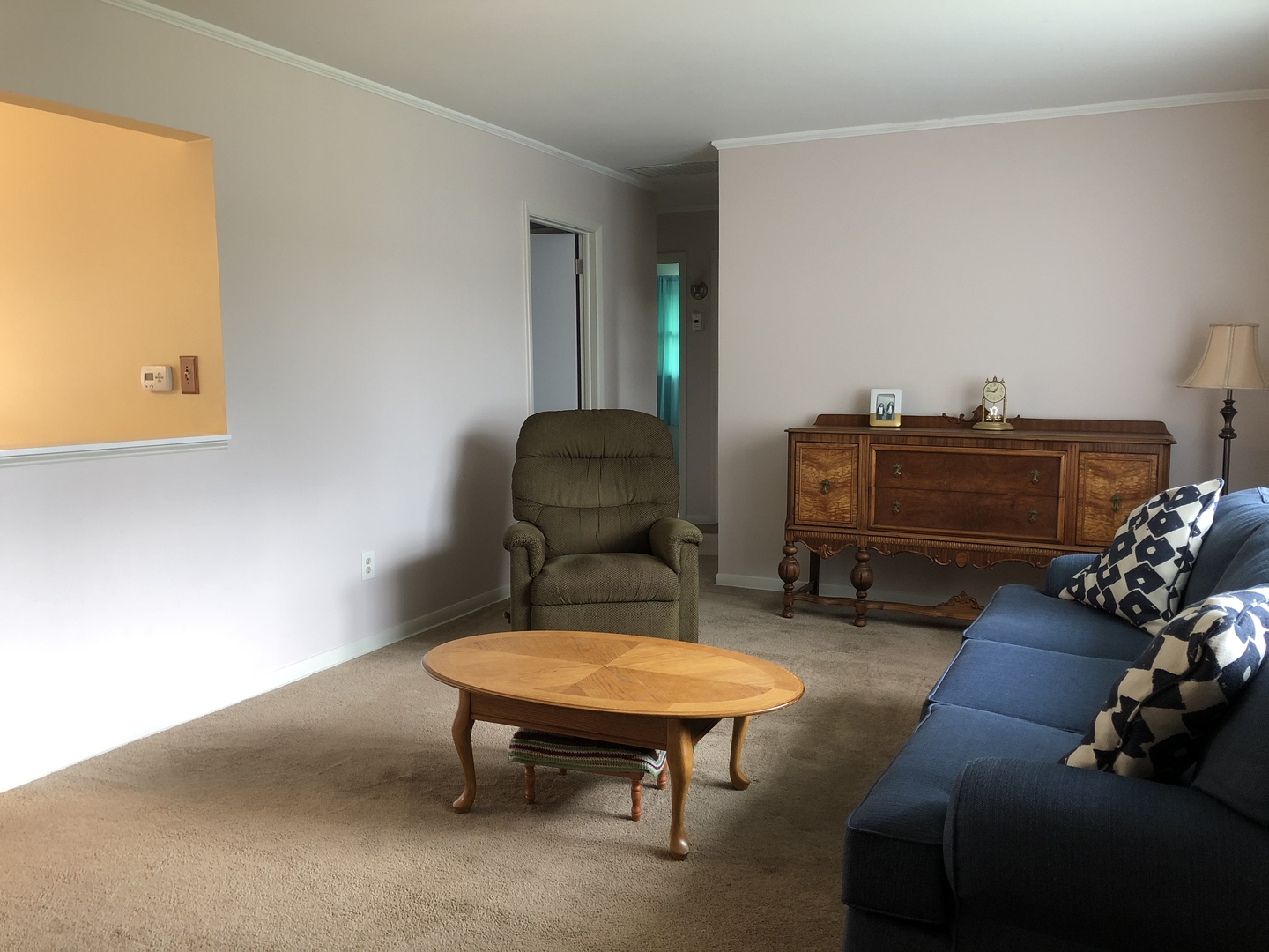 2004 Old Elm Road Lindenhurst, IL 60046 - Photo 3 of 19 a living room with furniture a rug and a window