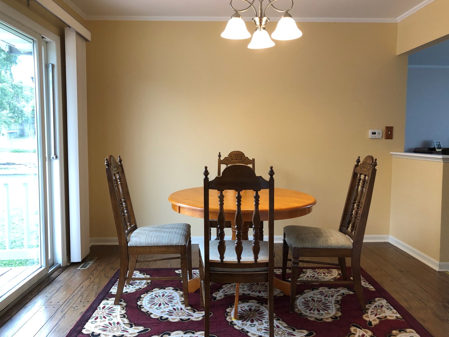 2004 Old Elm Road Lindenhurst, IL 60046 - Photo 7 of 19 a view of a dining room with furniture window and wooden floor