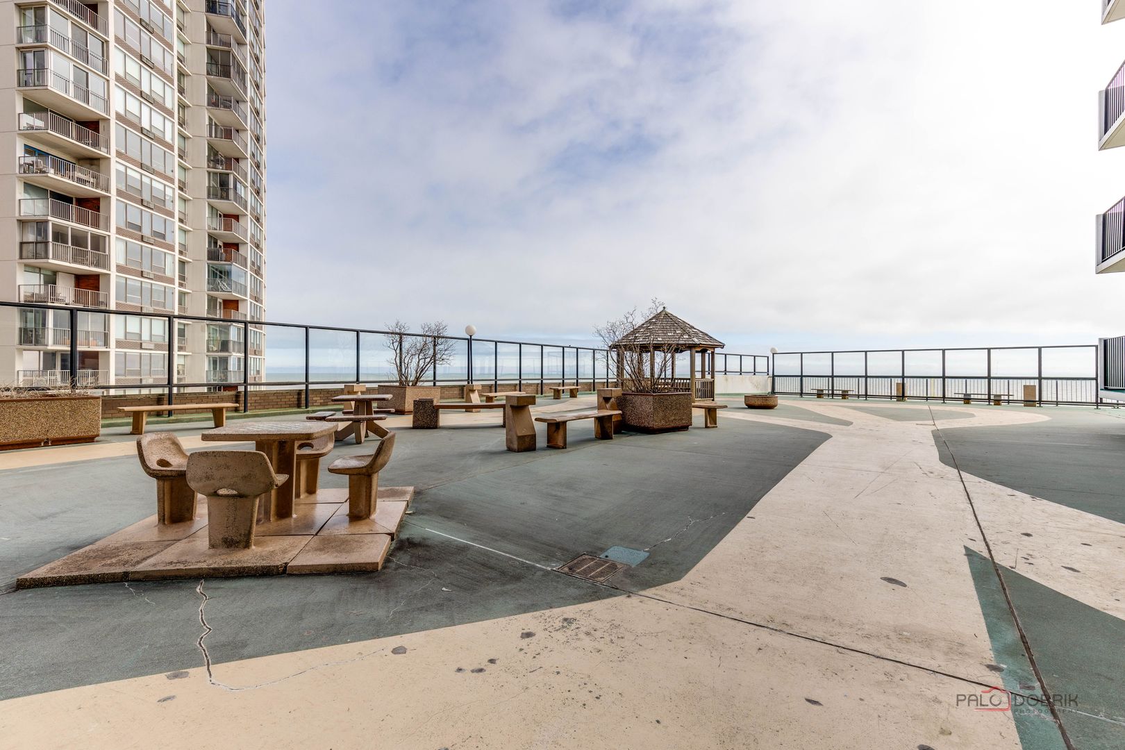 6033 North Sheridan Road, Unit 20K Chicago, IL 60660 - Photo 17 of 25 a view of a swimming pool with a lounge chair