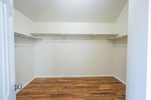 a view of a room with racks on the wall