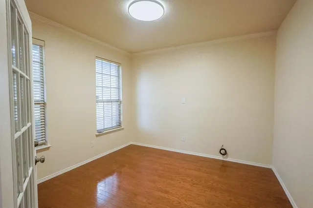 an empty room with windows