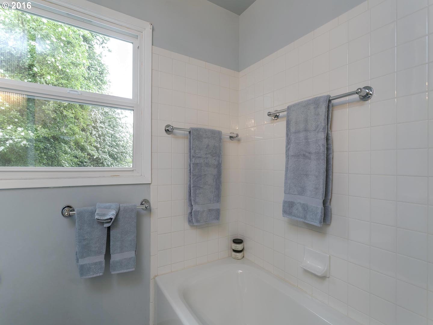 7610 Southwest Miner Way Portland, OR 97225 - Photo 16 of 32 a bathroom with a shower and a bathtub