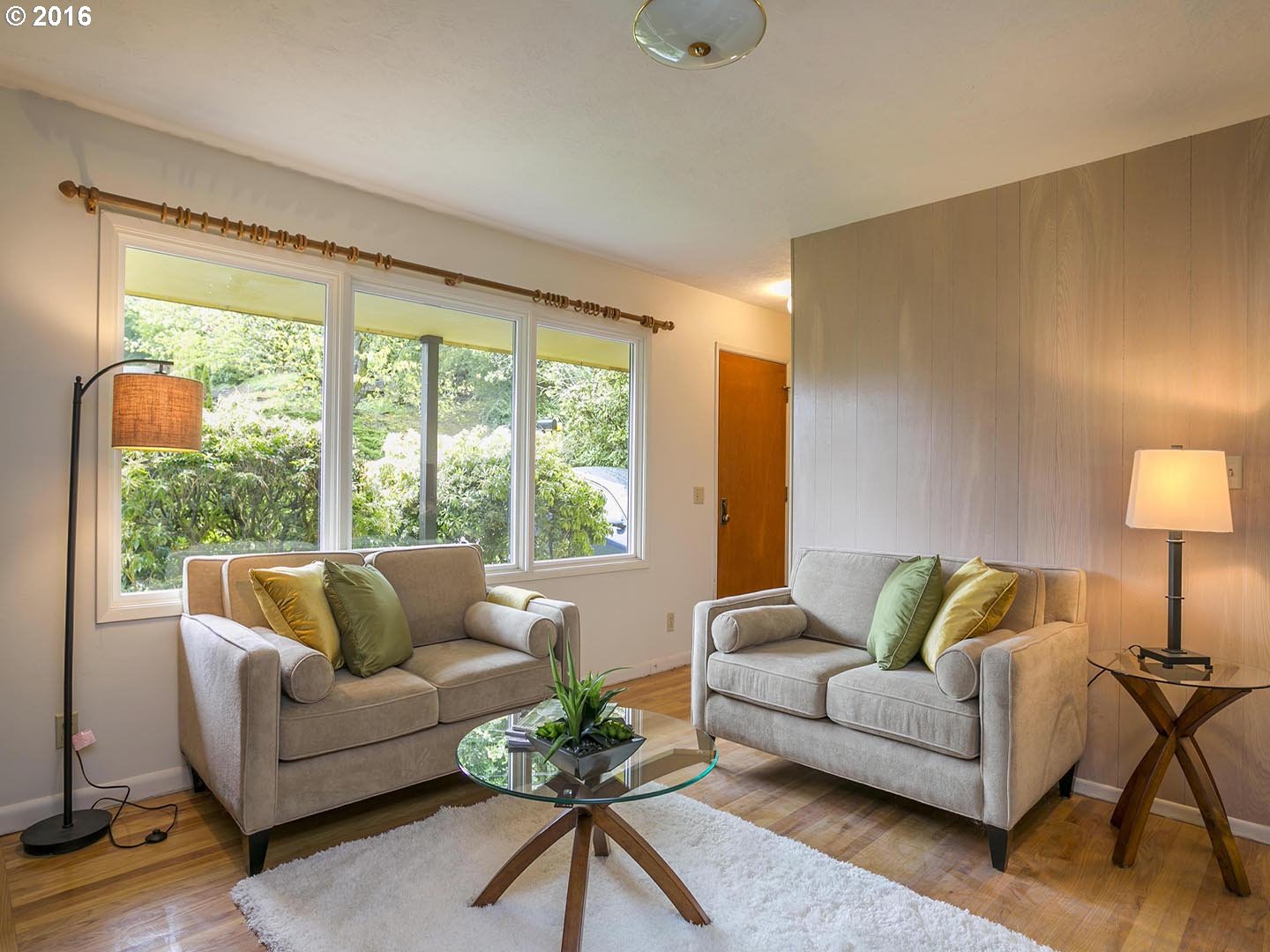 7610 Southwest Miner Way Portland, OR 97225 - Photo 2 of 32 a living room with furniture and a large window