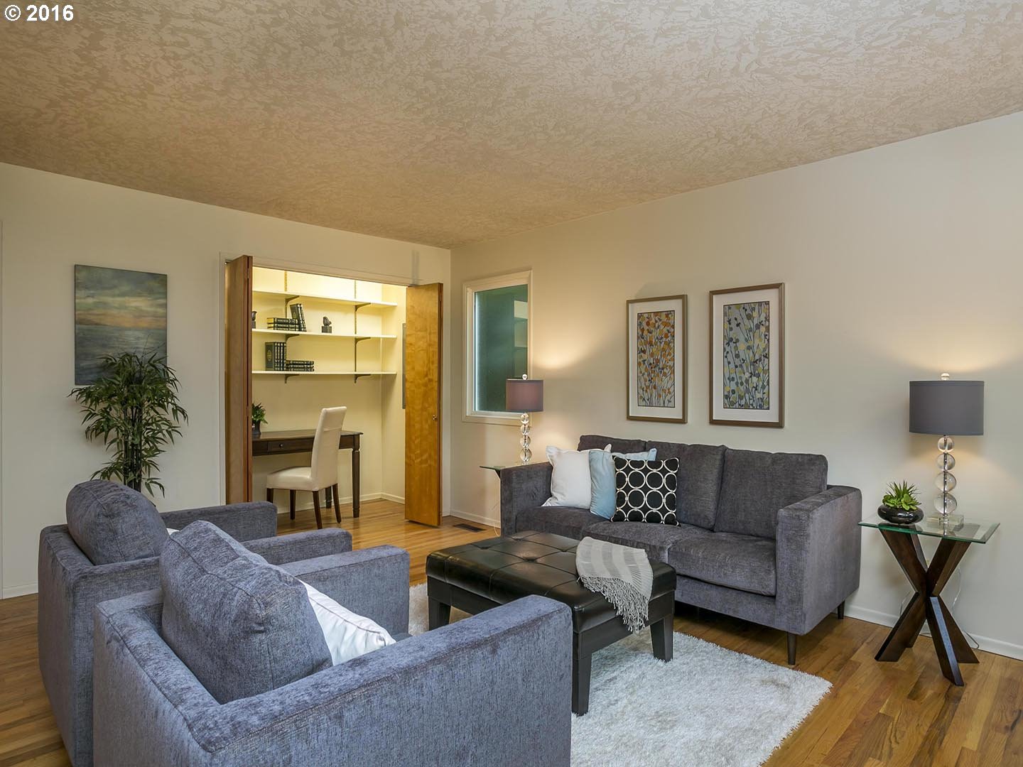7610 Southwest Miner Way Portland, OR 97225 - Photo 5 of 32 a living room with furniture and a large window