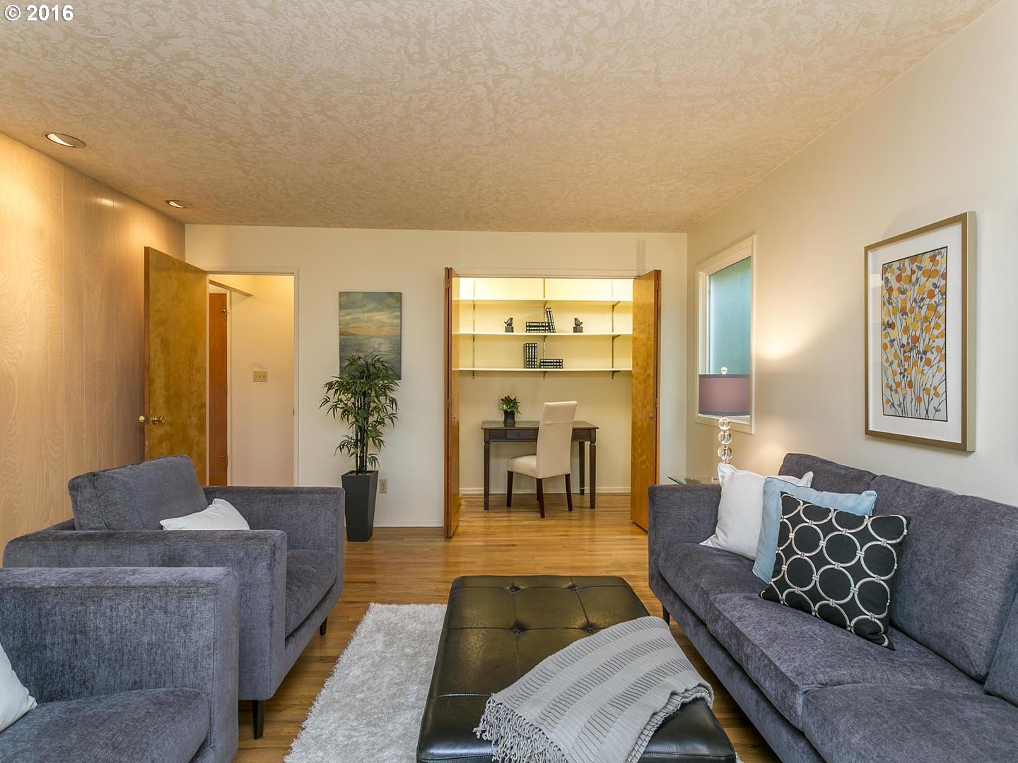 7610 Southwest Miner Way Portland, OR 97225 - Photo 6 of 32 a living room with furniture and a large window