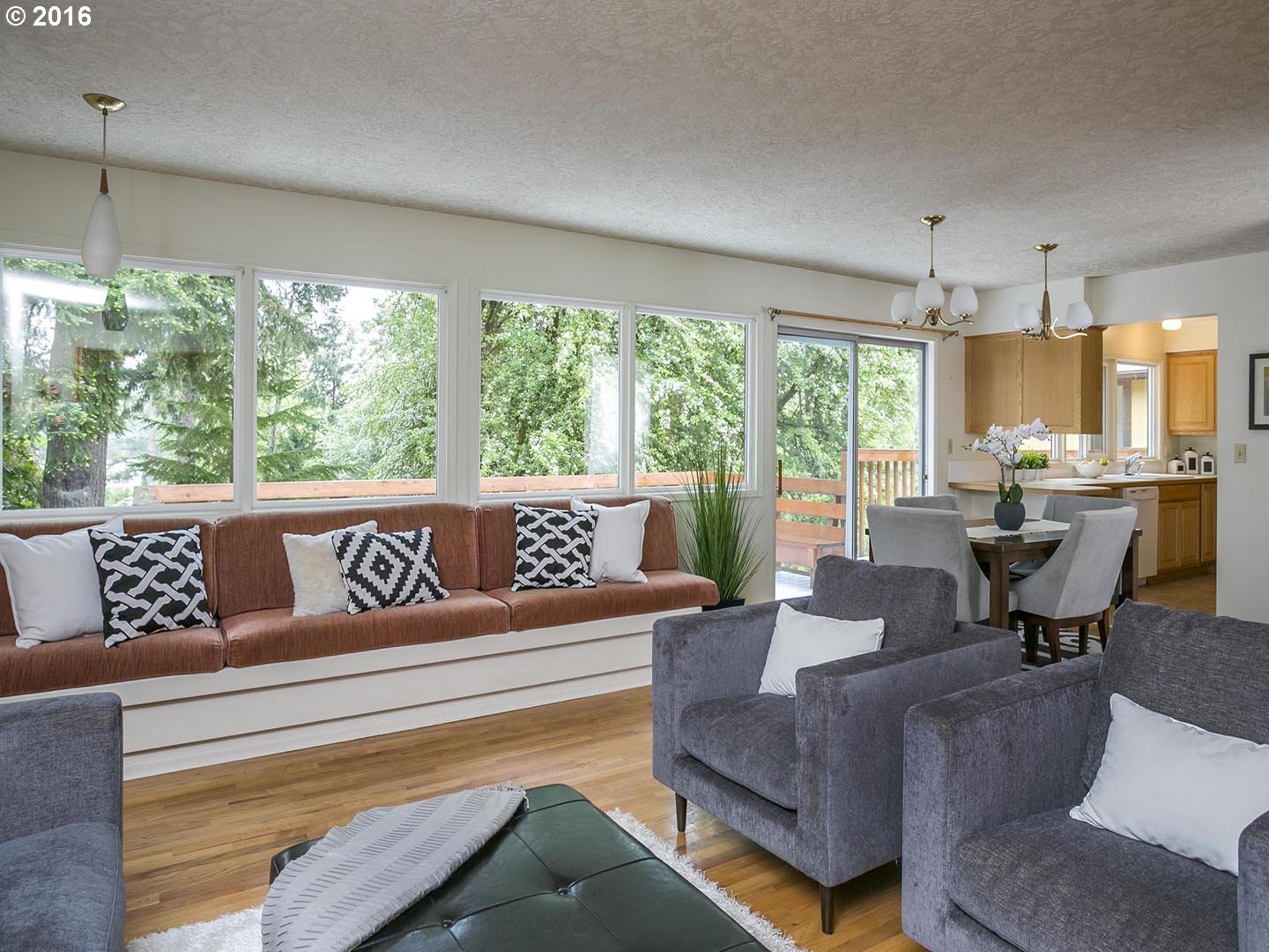 7610 Southwest Miner Way Portland, OR 97225 - Photo 7 of 32 a living room with furniture and a large window
