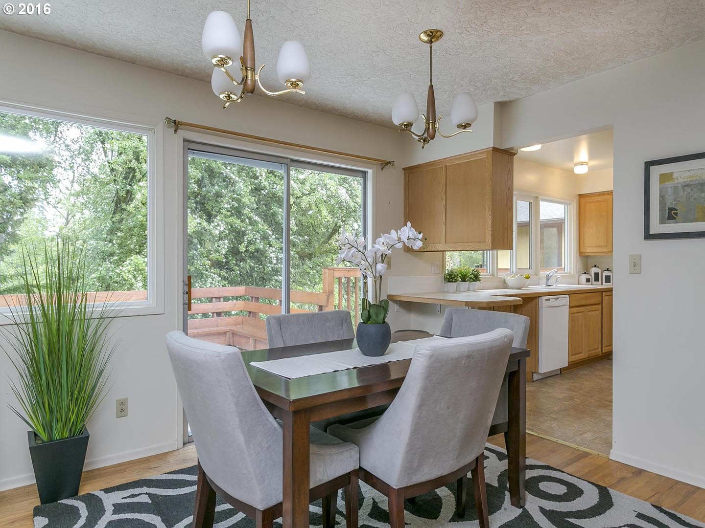 7610 Southwest Miner Way Portland, OR 97225 - Photo 8 of 32 a view of a dining room with furniture window and outside view