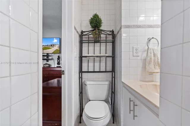 a bathroom with a sink a mirror and a shower